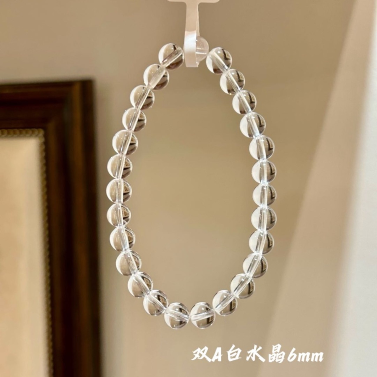 Pure Light - AA Clear Quartz 8mm Bracelet on white background