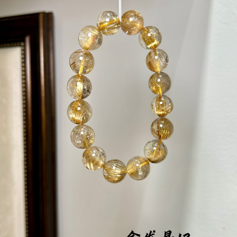 Golden Current - Golden Rutilated Quartz 13mm Bracelet on white background